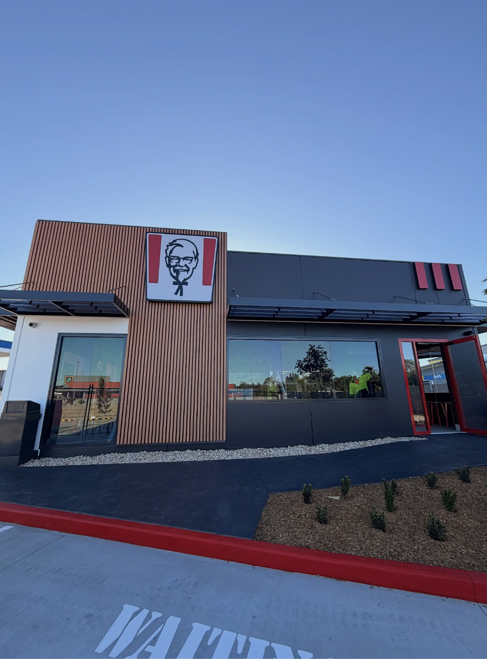 Commercial building exterior after painting and finishing work