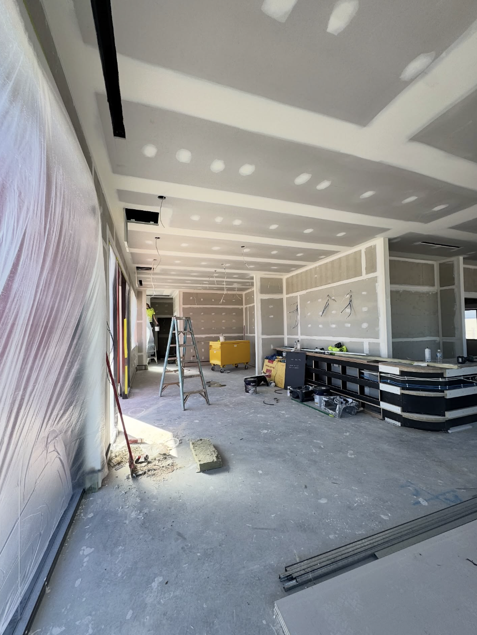 Commercial dining area before final paint and fit-out completion