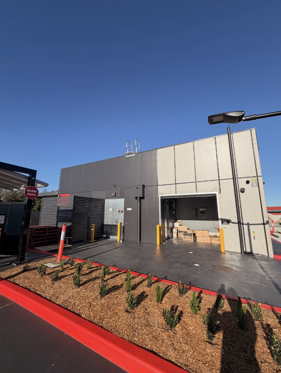 Commercial rear service area after painting and finishing work